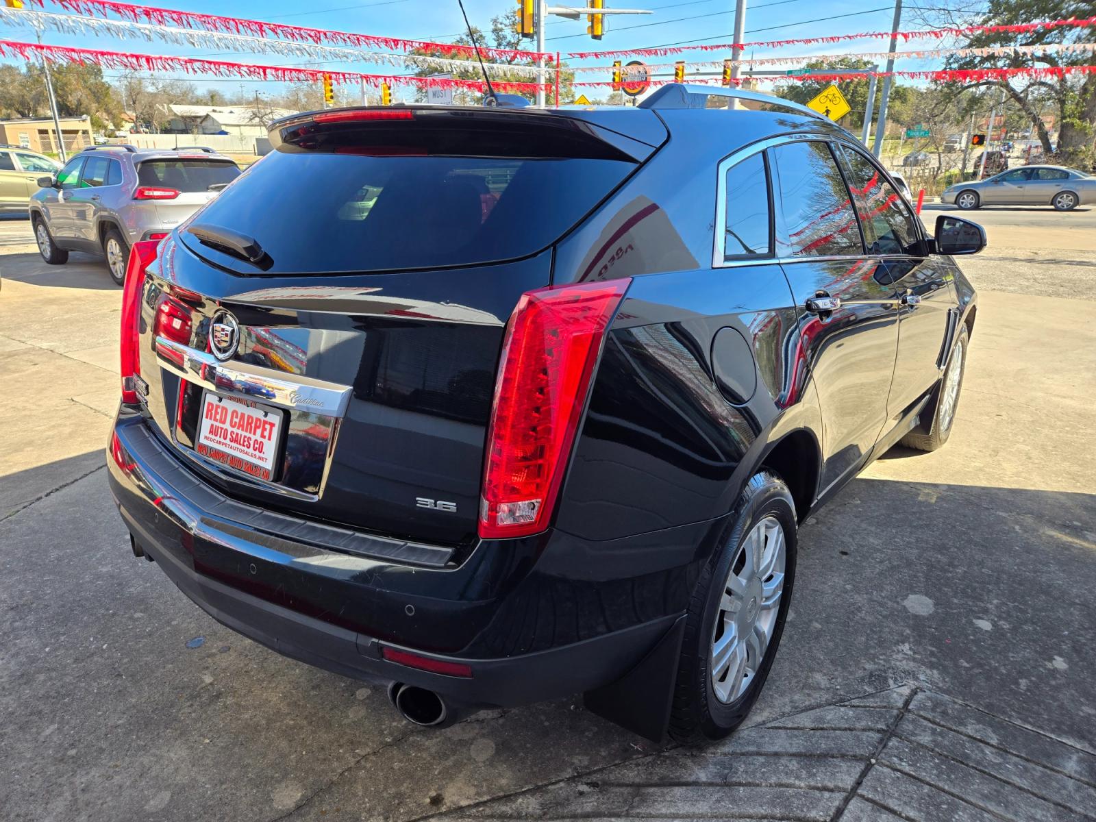 2015 BLACK Cadillac SRX (3GYFNBE37FS) with an 3.6L V6 F DOHC 24V engine, Automatic transmission, located at 503 West Court, Seguin, TX, 78155, (830) 379-3373, 29.568621, -97.969803 - 2015 Cadillac SRX Luxury Collection FWD with a 3.6L V6 F DOHC 24V, Automatic, Tilt, Cruise, AM/FM/CD Touchscreen Stereo, Power Windows, Locks, Seat and Side Mirrors, Leather Seats, Bluetooth, Tinted Windows, Power Sunroof, Power Rear Hatch, Dual Climate Control, Rear A/C, Alloy Wheels, Onstar Capabi - Photo #2